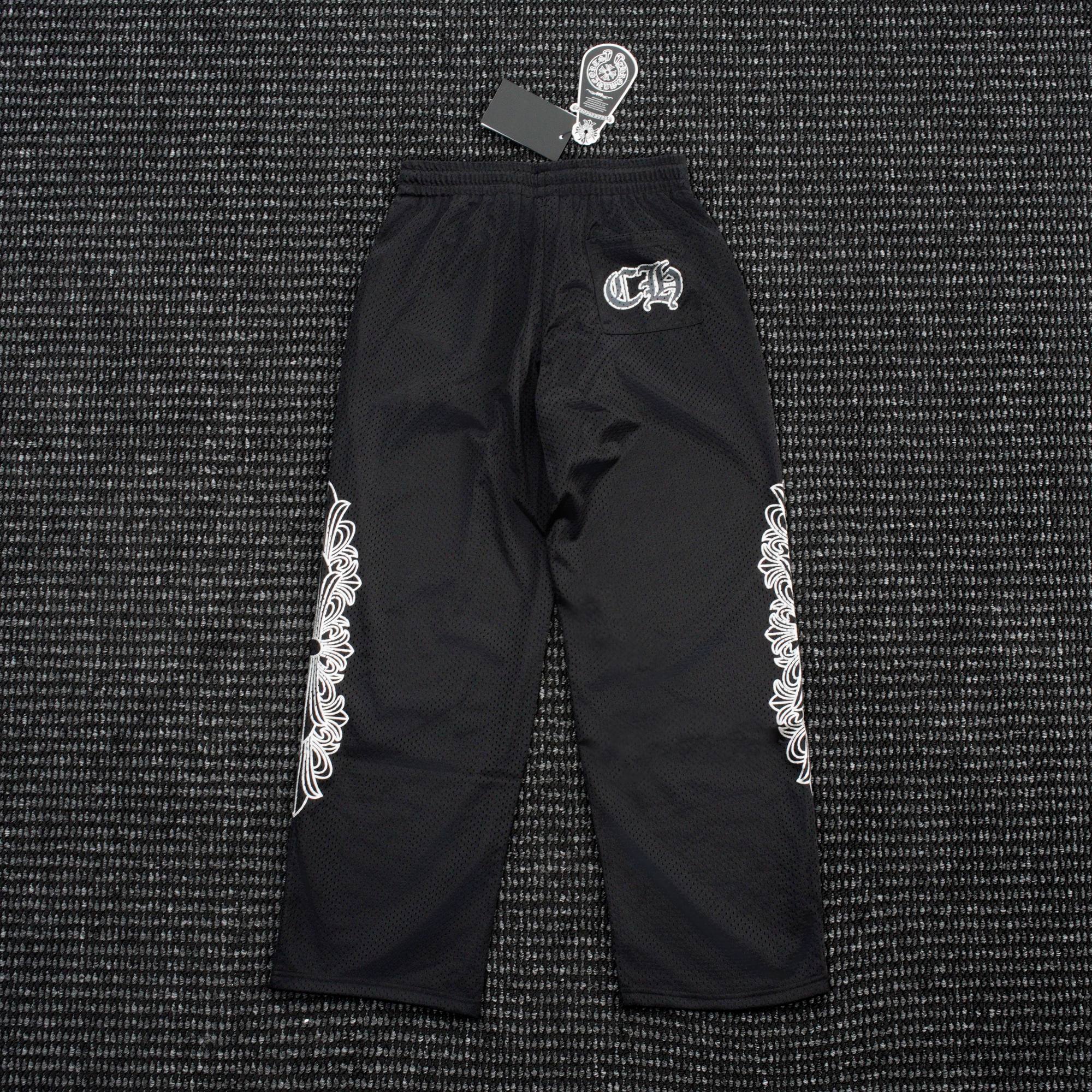 Chrome Hearts Sanskrit Cross Graphic Wide-Leg Pants — hero