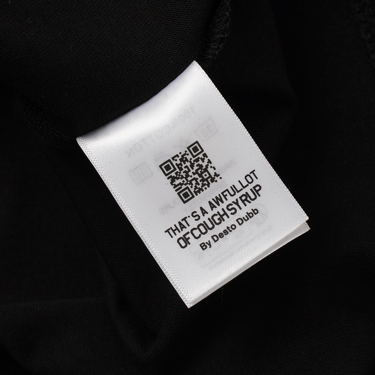 THAT'S A AWFUL LOT OF COUGH SYRUP P47 Graphic Black Short-Sleeve T-Shirt — neck_label