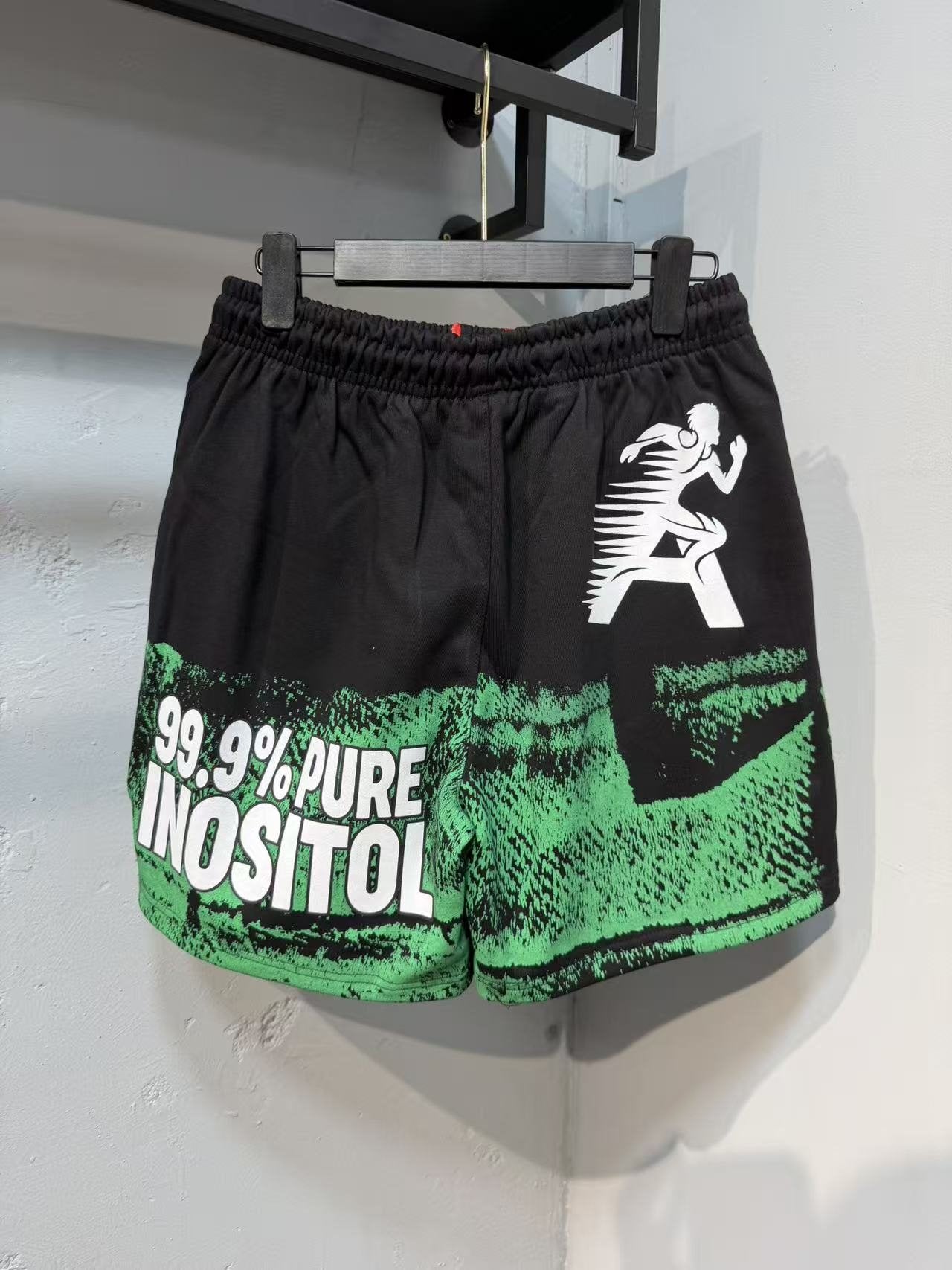 ASAALL Black Multicolor Graphic Shorts — context