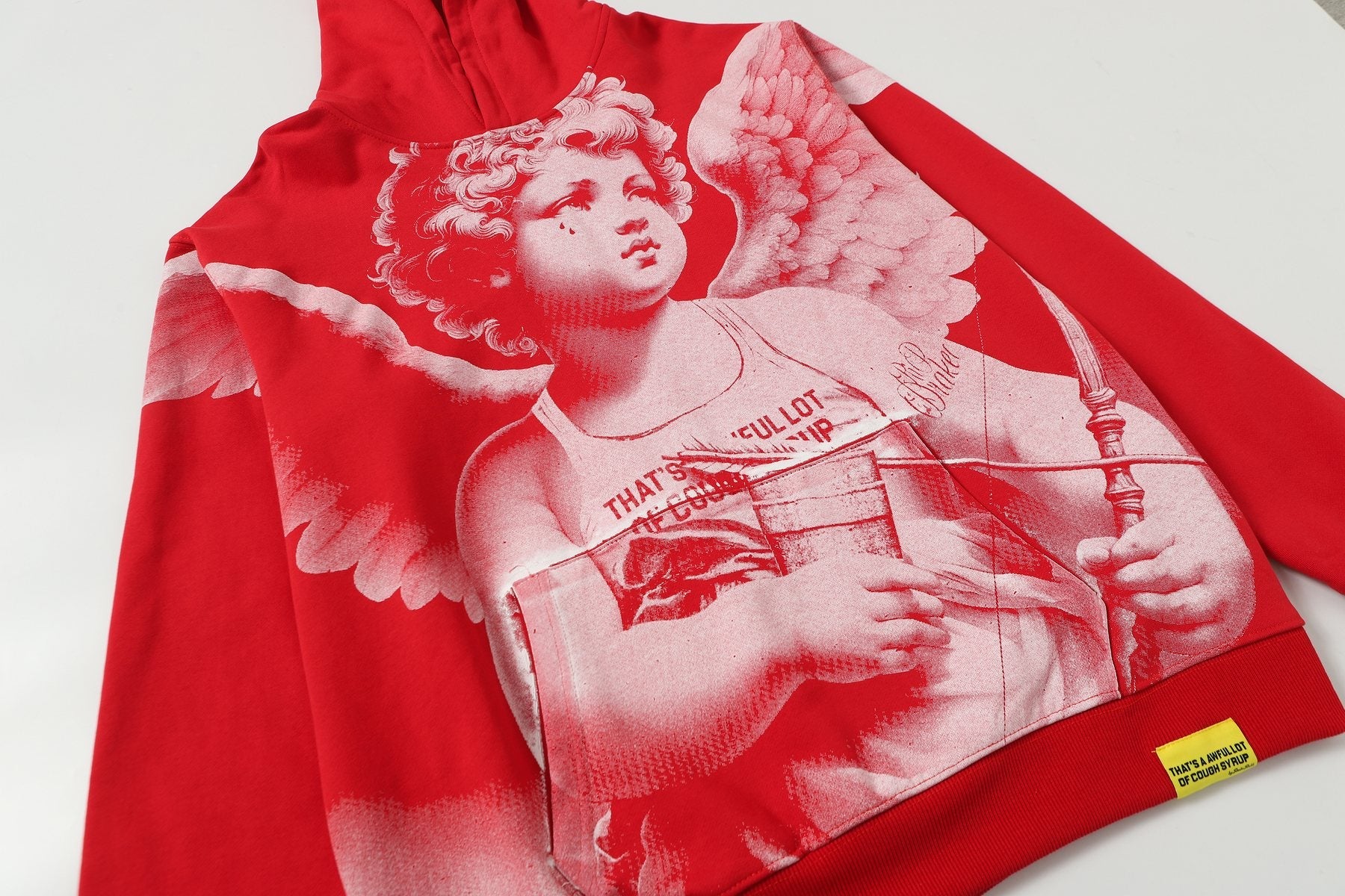 THAT'S A AWFUL LOT OF COUGH SYRUP Angel Graphic Hoodie — detail