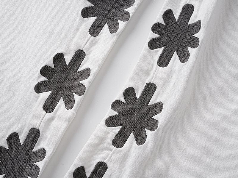 LOSTSHDWS Flower Graphic Flared Jeans — detail