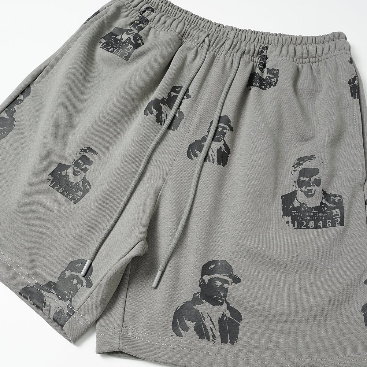 ASAALL All-Over Portrait Graphic Drawstring Shorts — detail